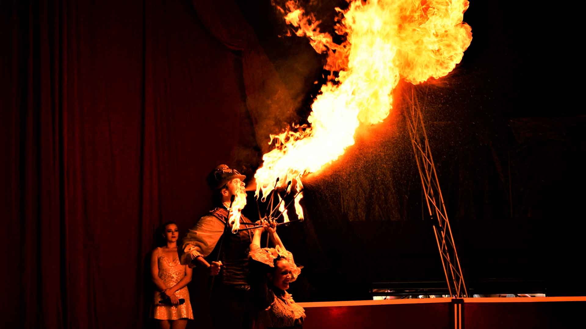 Circus Fire Show live fire breath and blazing flames on stage